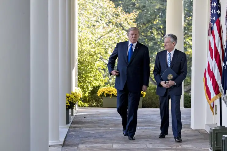 President Trump walks with Fed Chair-nominee Jerome Powell