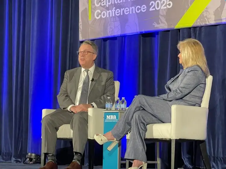 New York Fed President John Williams and MBA Chair Laura Escobar.jpg